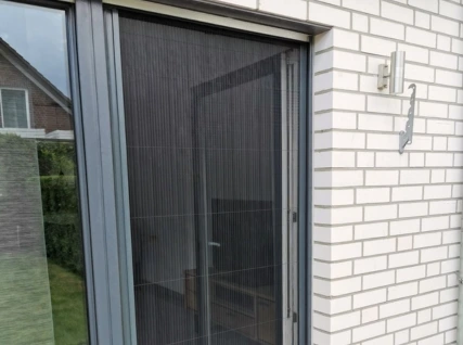Pleated and roll-up mosquito net fitted on window and door in Nagpur home